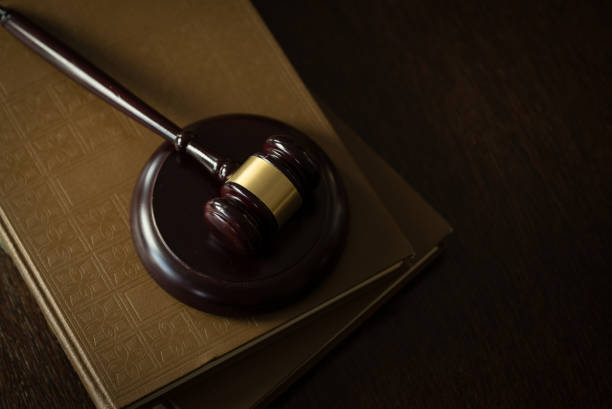 istock Law and Justice concept. Brown wooden background 918032494