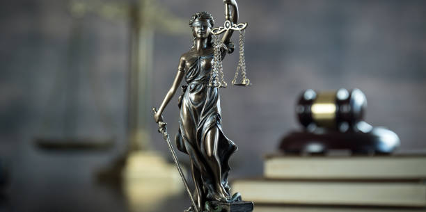 istock Law and Justice concept. Brown wooden background 918032536