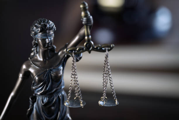 istock Law and Justice concept. Brown wooden background 918032566