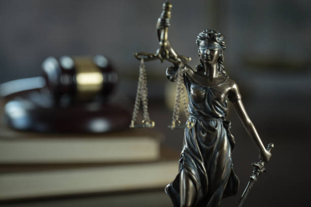 istock Law and Justice concept. Brown wooden background 918032652