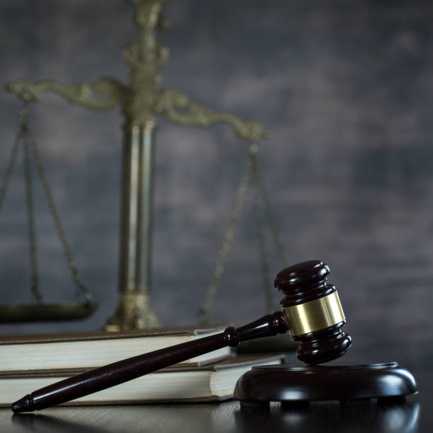 istock Law and Justice concept. Brown wooden background 918032688