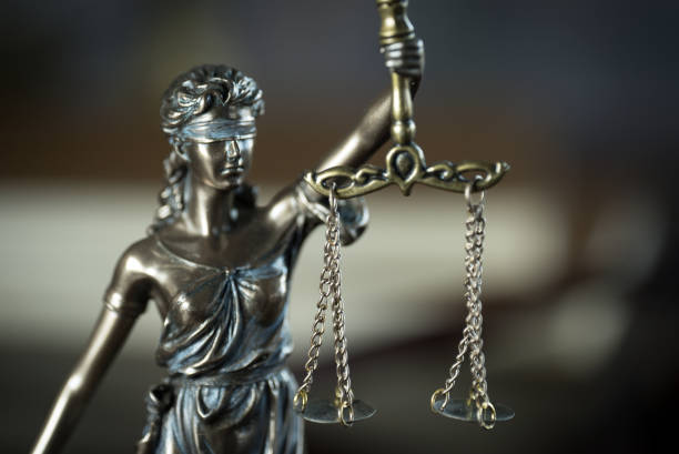 istock Law and Justice concept. Brown wooden background 918032948