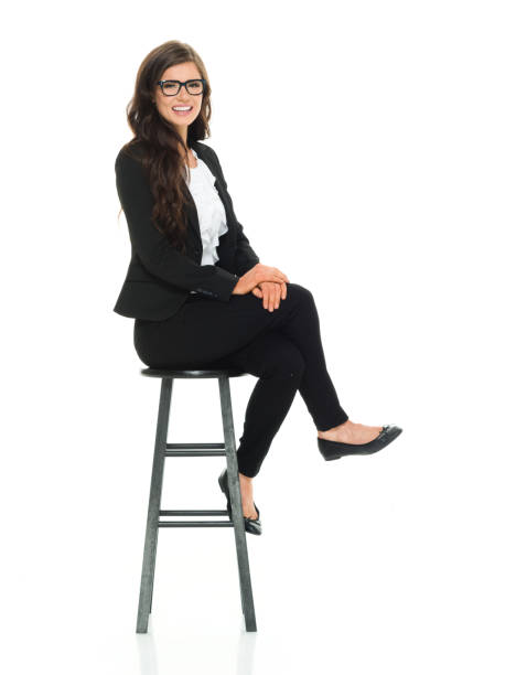 istock Businesswoman sitting on stool 918035352