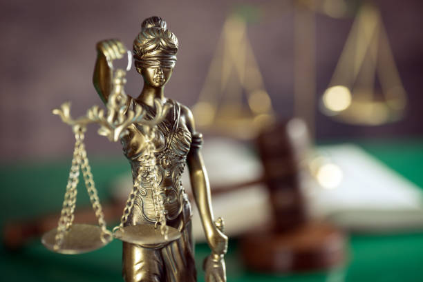 istock Law and Justice concept. Brown wooden background 918035372