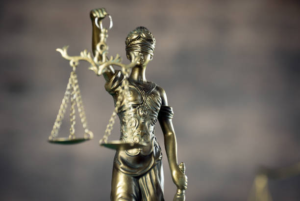istock Law and Justice concept. Brown wooden background 918035470