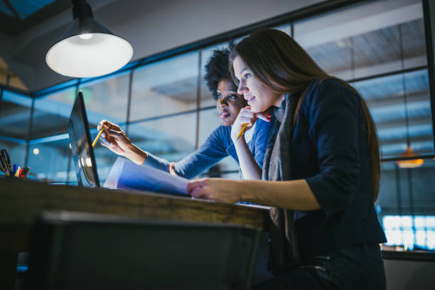 young female architects working together in architecture studio - engineering business white collar worker construction imagens e fotografias de stock