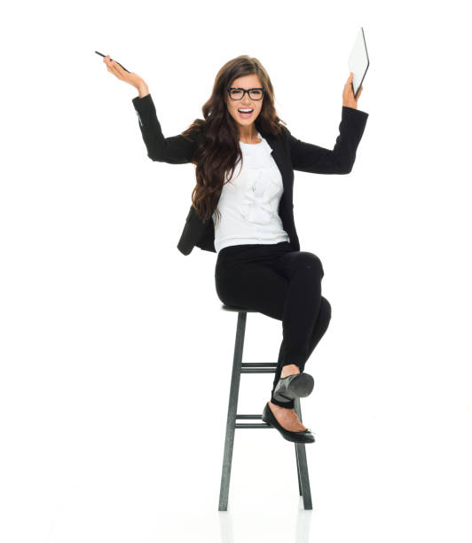 istock Businesswoman sitting on stool 918035994