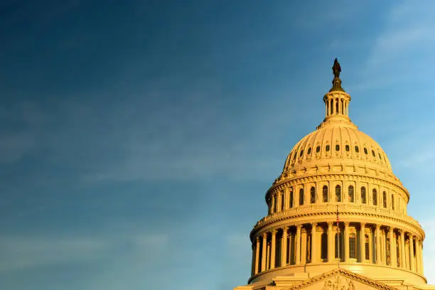 Photo of The United States Capitol building against Blue Sky, Washington DC