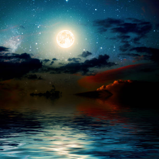 istock backgrounds night sky with stars and clouds. 918042268