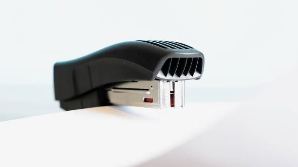 istock Stapler for office work on the table. Stationery item. 918043080