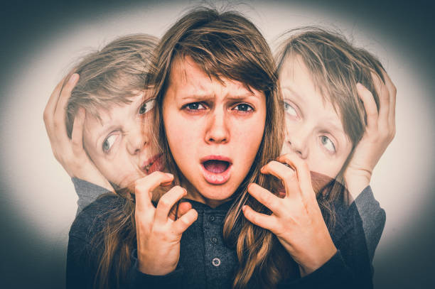 istock Woman with split personality suffers from schizophrenia 918046398