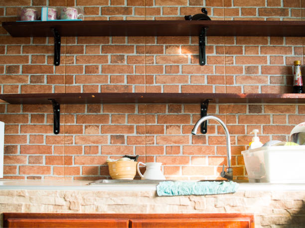 istock Cozy style kitchen are decorated with brick wall paper 918049890