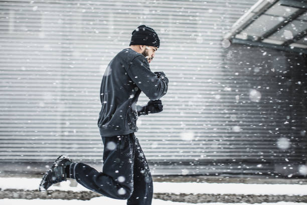 istock Male Athlete Exercising Outdoors in Winter 918050916
