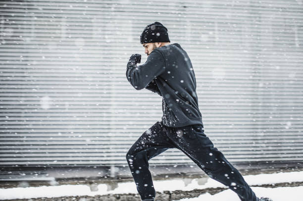 istock Male Athlete Exercising Outdoors in Winter 918050944