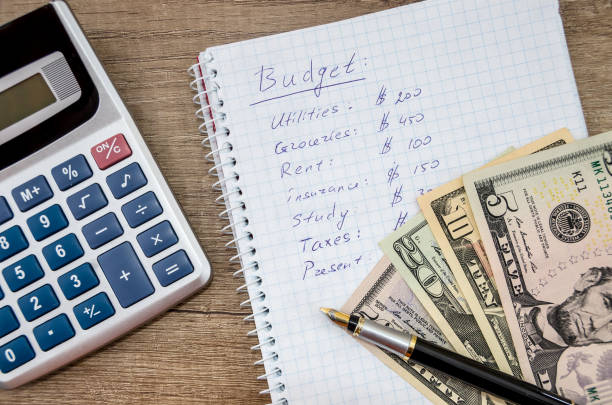 istock Home budget with money,  pen and calculator 918057558