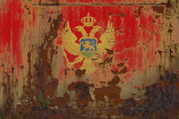 istock Montenegro Flag on a Dirty Rusty Grunge Metallic Surface 918057738