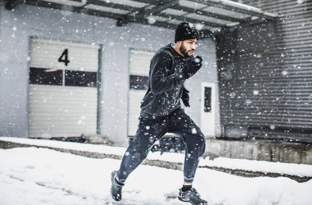 istock Male Athlete Exercising Outdoors in Winter 918060148
