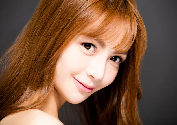 closeup young woman face with beautiful eyes