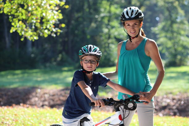 istock Mother and son in park 918065590