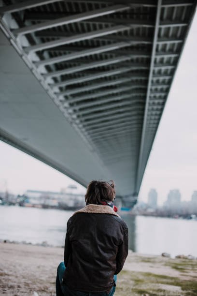 istock Man relaxing outdoors in the city 918073666