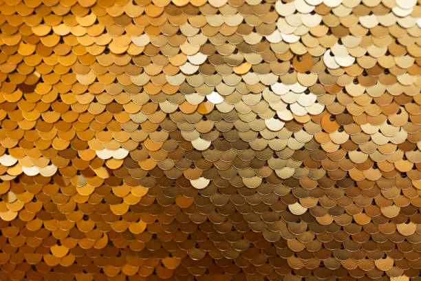 istock Golden and iridescent sequins texture background 918080616