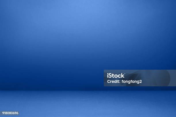 Empty Blue With Black Vignette Studio Well Use As Background Stock Photo - Download Image Now