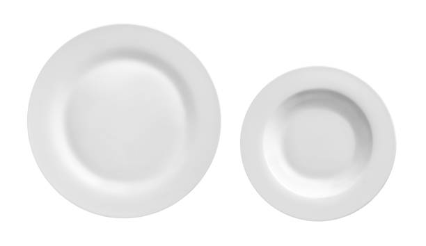 istock Top view of round plate or dishes isolated on white 918080708