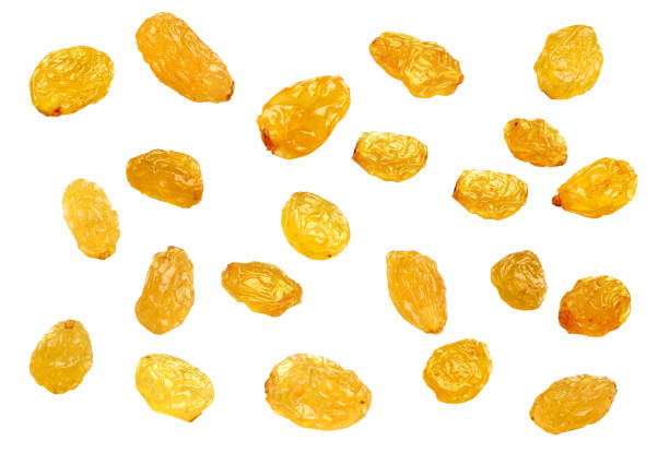 istock Close up of dried raisins isolated on white 918080732