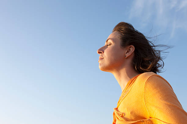 istock woman in the wind 91808221