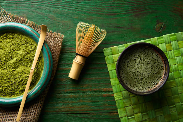 istock Matcha tea powder bamboo chasen and spoon 918083362