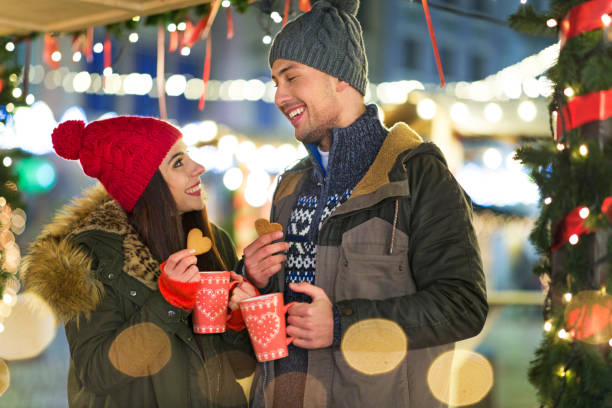 istock Young Couple Having Fun Outdoors At Christmas Time 918090352