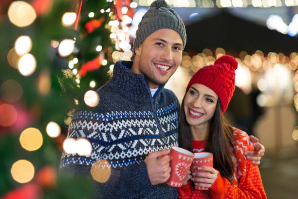 istock Young Couple Having Fun Outdoors At Christmas Time 918090364