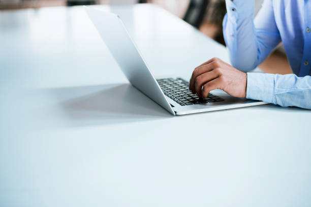 istock Male hands or men office worker typing on the keyboard 918091104