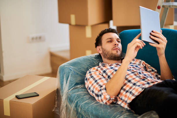 istock Man in new apartment 918095136