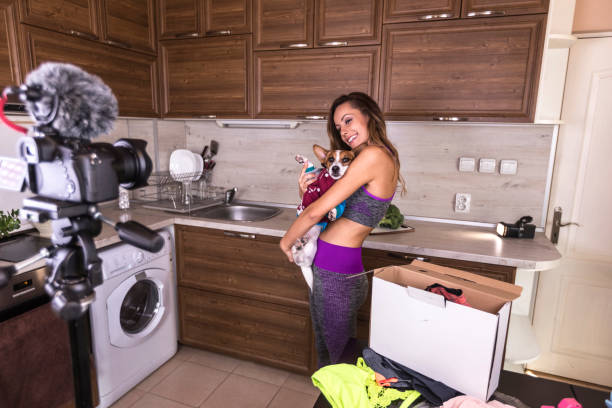 istock Female vlogger making video for sportwears 918095578