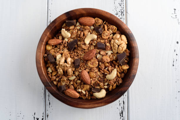 istock granola close up isolated on white background. 918099660