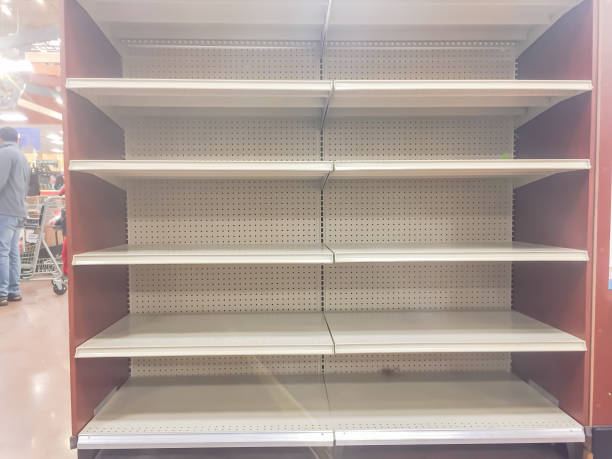 istock Empty shelves at grocery store in America 918109834