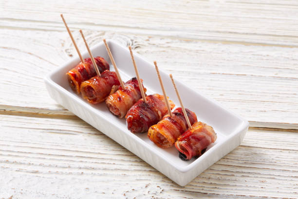 istock pinchos Bacon wrapped dates pintxos tapas 918109948