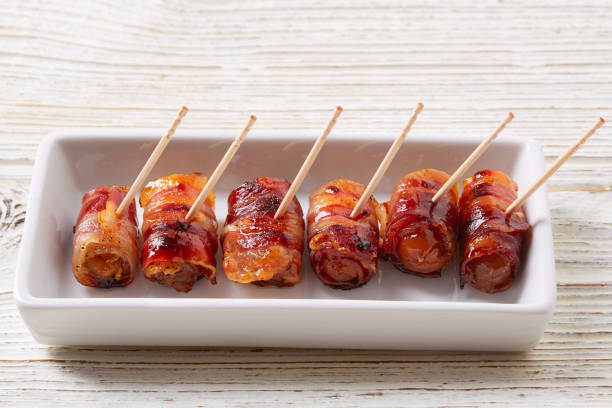 istock pinchos Bacon wrapped dates pintxos tapas 918110004