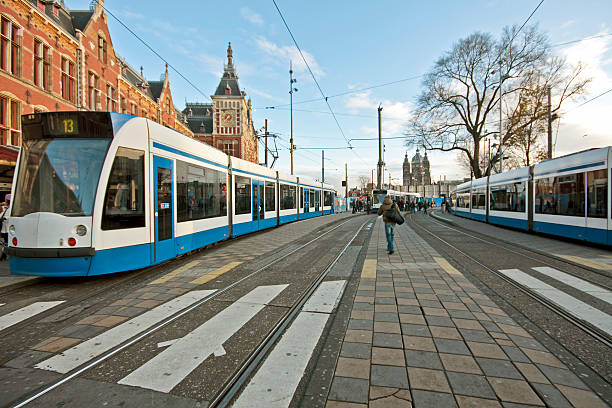 istock Trams at the main station in Amsterdam Netherlands 91811114