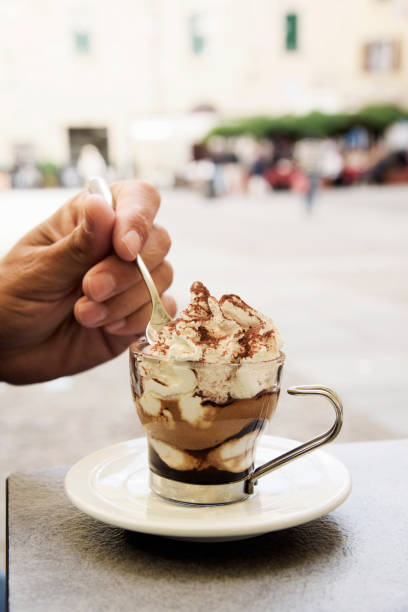 istock young man having a mocha latte coffee outdoors 918113258