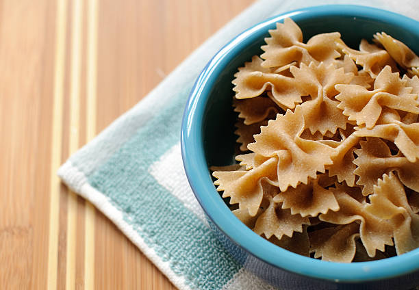 istock Raw Bow Tie Pasta in Blue Prep Bowl 91811360