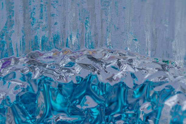 istock Macro abstract of textured crystal glass reflecting color 918114020