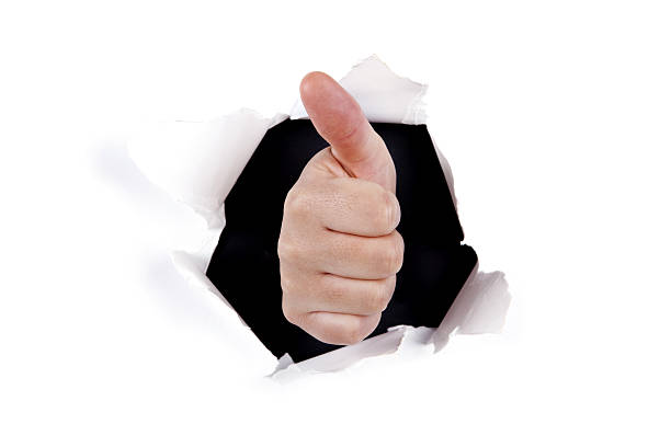 istock ok hand sign thru wall hole 91811512
