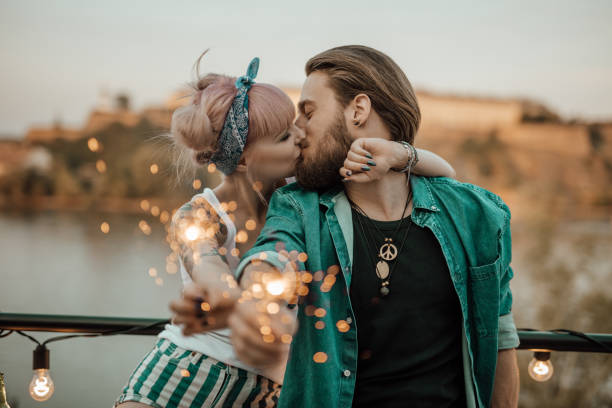 istock Young couple kissing at balcony 918117302