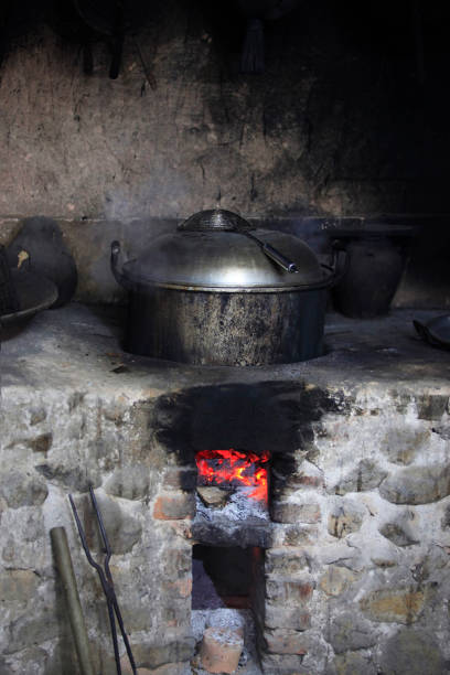 istock An old stone stove with an old saucepan. China 918117748