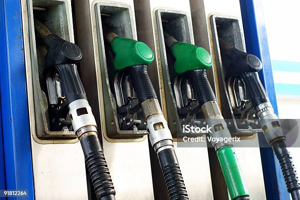 Gas Pump Handles Nozzles Stock Photo - Download Image Now - Business, Car, Close-up