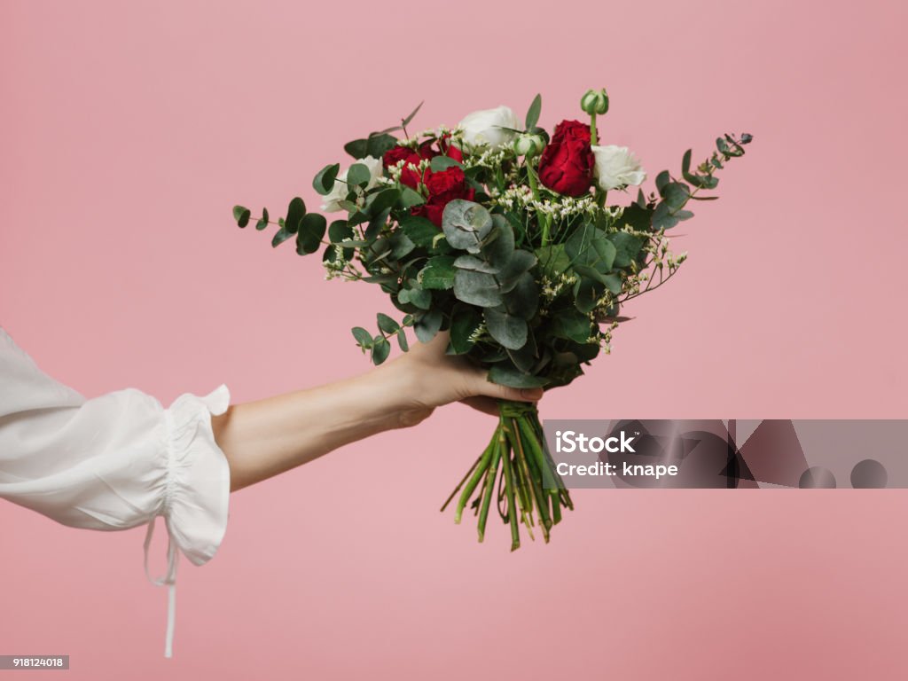 Photo of woman holding beautiful bouquet of flowers roses pink background Flower Stock Photo