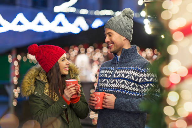 istock Young Couple Having Fun Outdoors At Christmas Time 918124572