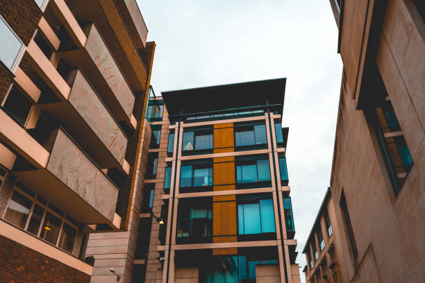 istock some modern brown apartment houses with copy space in the middle 918128478